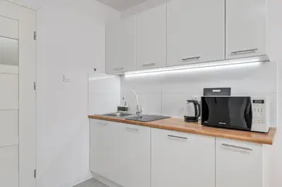 Kuchnia lub aneks kuchenny w obiekcie Andersena 190 A - 12 piętro - 10 min CMKP - 5 min Metro - 15 min Centrum