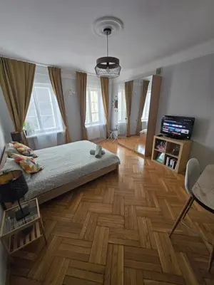 Łóżko lub łóżka w pokoju w obiekcie Freta 11 Old Town