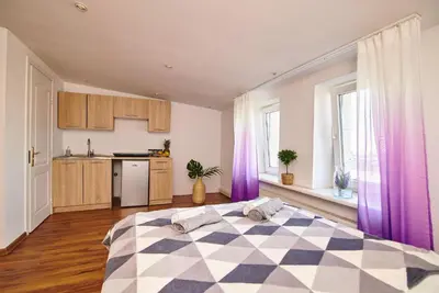 Kuchnia lub aneks kuchenny w obiekcie Regem Apartments Waryńskiego