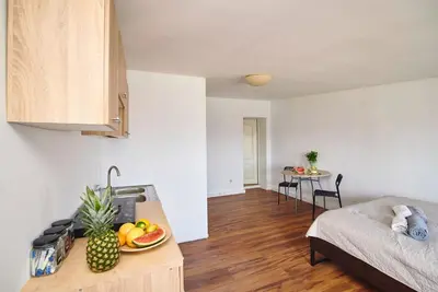 Łóżko lub łóżka w pokoju w obiekcie Regem Apartments Waryńskiego