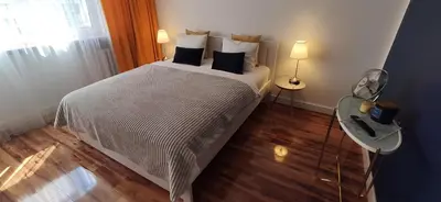 Łóżko lub łóżka w pokoju w obiekcie Comfortable Studio Old Town/New City