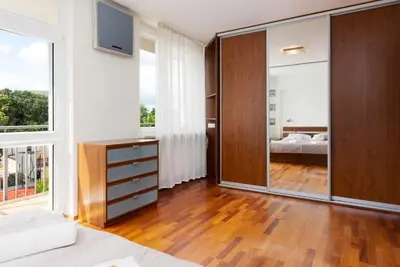Łóżko lub łóżka w pokoju w obiekcie Apartments Warsaw Niecala Noclegi Renters