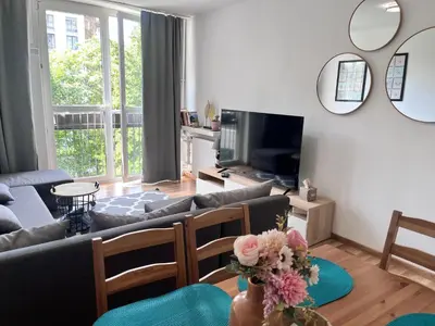 Telewizja i/lub zestaw kina domowego w obiekcie OhMyHome - Park Mirowski Apartment
