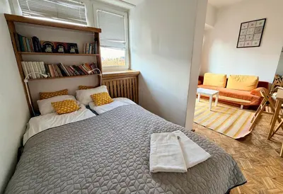 Łóżko lub łóżka w pokoju w obiekcie OhMyHome - Sunny Apartment in City Center