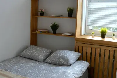 Łóżko lub łóżka w pokoju w obiekcie OhMyHome - Sunny Apartment in City Center