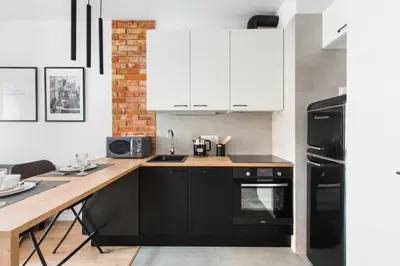 Kuchnia lub aneks kuchenny w obiekcie SuperApart Stalowa 39 Modern Unit with Kitchen & Wifi
