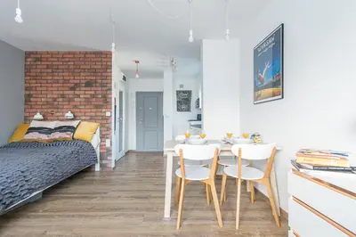 Łóżko lub łóżka w pokoju w obiekcie Murano Art Home