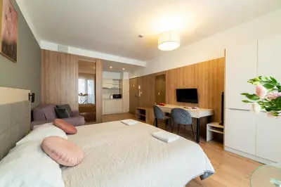 Telewizja i/lub zestaw kina domowego w obiekcie Wolska Residence I
