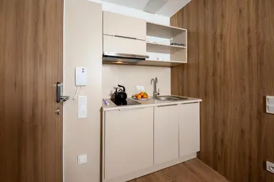 Kuchnia lub aneks kuchenny w obiekcie Wolska Residence I