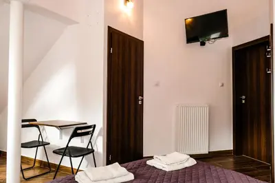 Telewizja i/lub zestaw kina domowego w obiekcie Villa 37b Bed and Breakfast