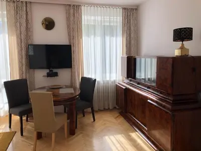 Telewizja i/lub zestaw kina domowego w obiekcie Art deco Apartment