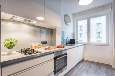 Kuchnia lub aneks kuchenny w obiekcie Nowogrodzka 38 Serviced Apartments