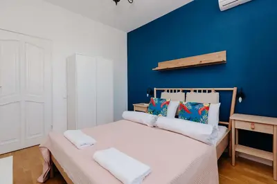 Łóżko lub łóżka w pokoju w obiekcie ShortStayPoland Marszałkowska (B12)