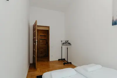 Łóżko lub łóżka w pokoju w obiekcie ShortStayPoland Grzybowska (B16)