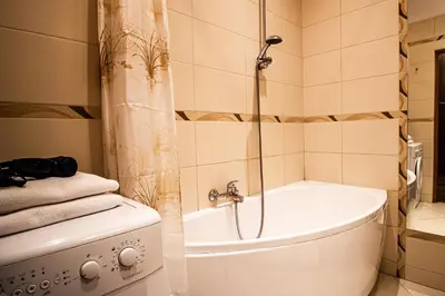 Łazienka w obiekcie Świętojańska Old Town Apartment by BookingHost