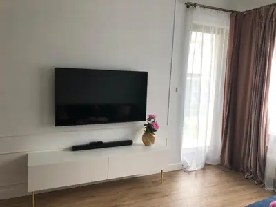 Telewizja i/lub zestaw kina domowego w obiekcie Mlociny Apartment