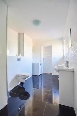 Łazienka w obiekcie Regem Apartments Płońska