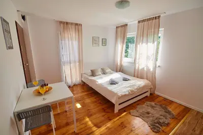 Łóżko lub łóżka w pokoju w obiekcie Regem Apartments Płońska