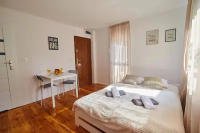 Łóżko lub łóżka w pokoju w obiekcie Regem Apartments Płońska