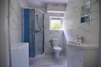 Łazienka w obiekcie Regem Apartments Płońska