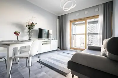 Telewizja i/lub zestaw kina domowego w obiekcie VipWarsawApartments Diamond Mennica Residence