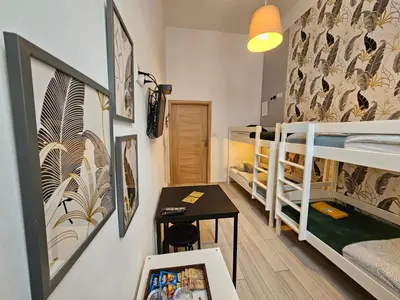 Łóżko lub łóżka w pokoju w obiekcie Deja Vu Hostel