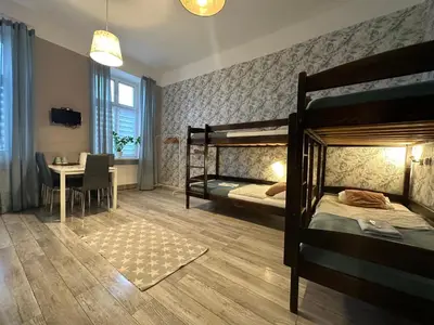 Łóżko lub łóżka w pokoju w obiekcie Deja Vu Hostel