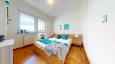 Łóżko lub łóżka w pokoju w obiekcie Silent Apartment Center