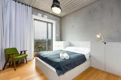 Łóżko lub łóżka w pokoju w obiekcie Apartment Praga Center by Noclegi Renters