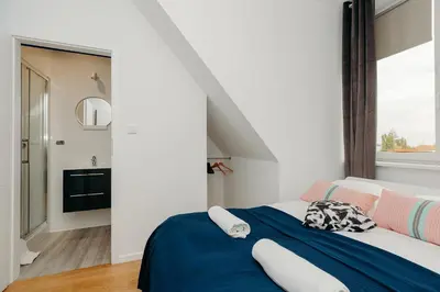 Łóżko lub łóżka w pokoju w obiekcie ShortStayPoland Piękna (B20)