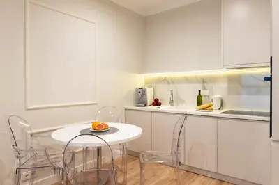 Kuchnia lub aneks kuchenny w obiekcie Mennica Residence I