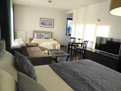 Łóżko lub łóżka w pokoju w obiekcie Apartamenty Arkadia by VisitWarsaw Apartments