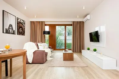 Telewizja i/lub zestaw kina domowego w obiekcie Apartments Warsaw Magazynowa by Noclegi Renters