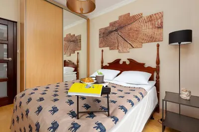 Łóżko lub łóżka w pokoju w obiekcie Apartments Warsaw Giełdowa 4 by Noclegi Renters