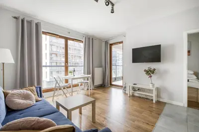 Telewizja i/lub zestaw kina domowego w obiekcie Warsaw Night Apartments Grzybowska