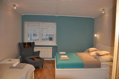 Łóżko lub łóżka w pokoju w obiekcie Cichy Zakątek - ekskluzywny apartament 90 m2