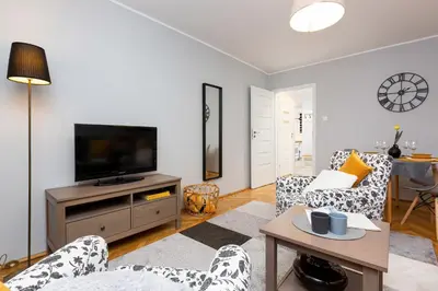 Telewizja i/lub zestaw kina domowego w obiekcie Apartment Warsaw Kredytowa by Noclegi Renters