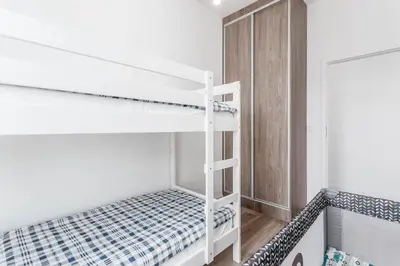 Łóżko lub łóżka w pokoju w obiekcie Chill Apartments Ursynów Premium