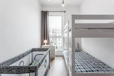 Łóżko lub łóżka w pokoju w obiekcie Chill Apartments Ursynów Premium