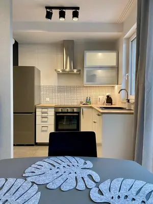 Kuchnia lub aneks kuchenny w obiekcie Panoramic view apartments Warsaw West II