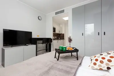 Telewizja i/lub zestaw kina domowego w obiekcie Apartments Warsaw Wola Business Center by Noclegi Renters