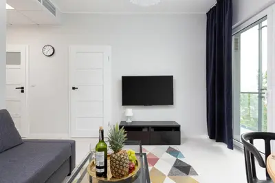 Telewizja i/lub zestaw kina domowego w obiekcie Apartments Warsaw Wola Business Center by Noclegi Renters