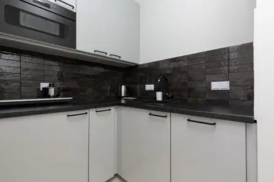 Kuchnia lub aneks kuchenny w obiekcie Apartments Warsaw Wola Business Center by Noclegi Renters