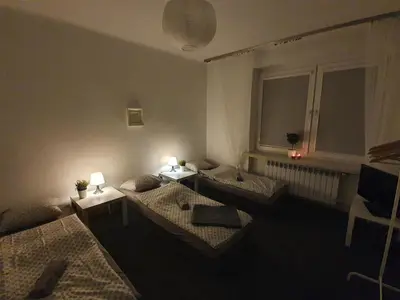 Łóżko lub łóżka w pokoju w obiekcie Hostel Czecha