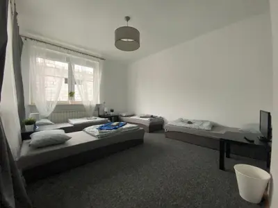 Łóżko lub łóżka w pokoju w obiekcie Hostel Czecha