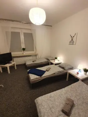 Łóżko lub łóżka w pokoju w obiekcie Hostel Czecha