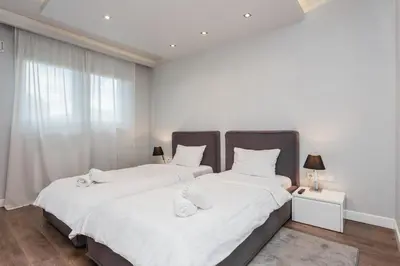 Łóżko lub łóżka w pokoju w obiekcie Oxygen Residence