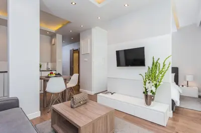 Telewizja i/lub zestaw kina domowego w obiekcie Oxygen Residence