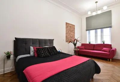 Łóżko lub łóżka w pokoju w obiekcie ShortStayPoland Górskiego (B33)