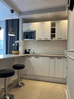 Kuchnia lub aneks kuchenny w obiekcie Airport Apartment Warszawa